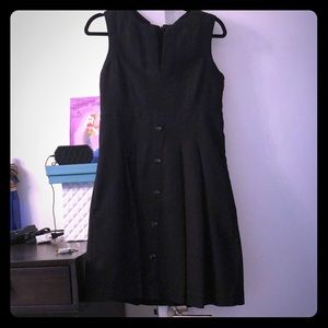 Tulle black sleeveless dress with back bow detail